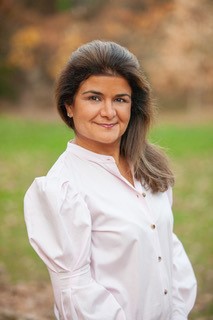 Naz Hassanein headshot